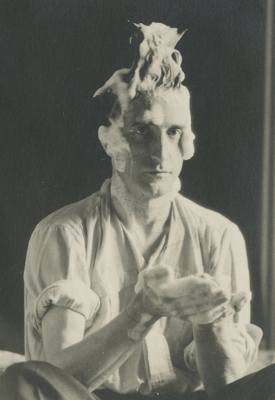 Marcel Duchamp photographed by Man Ray, 1924.